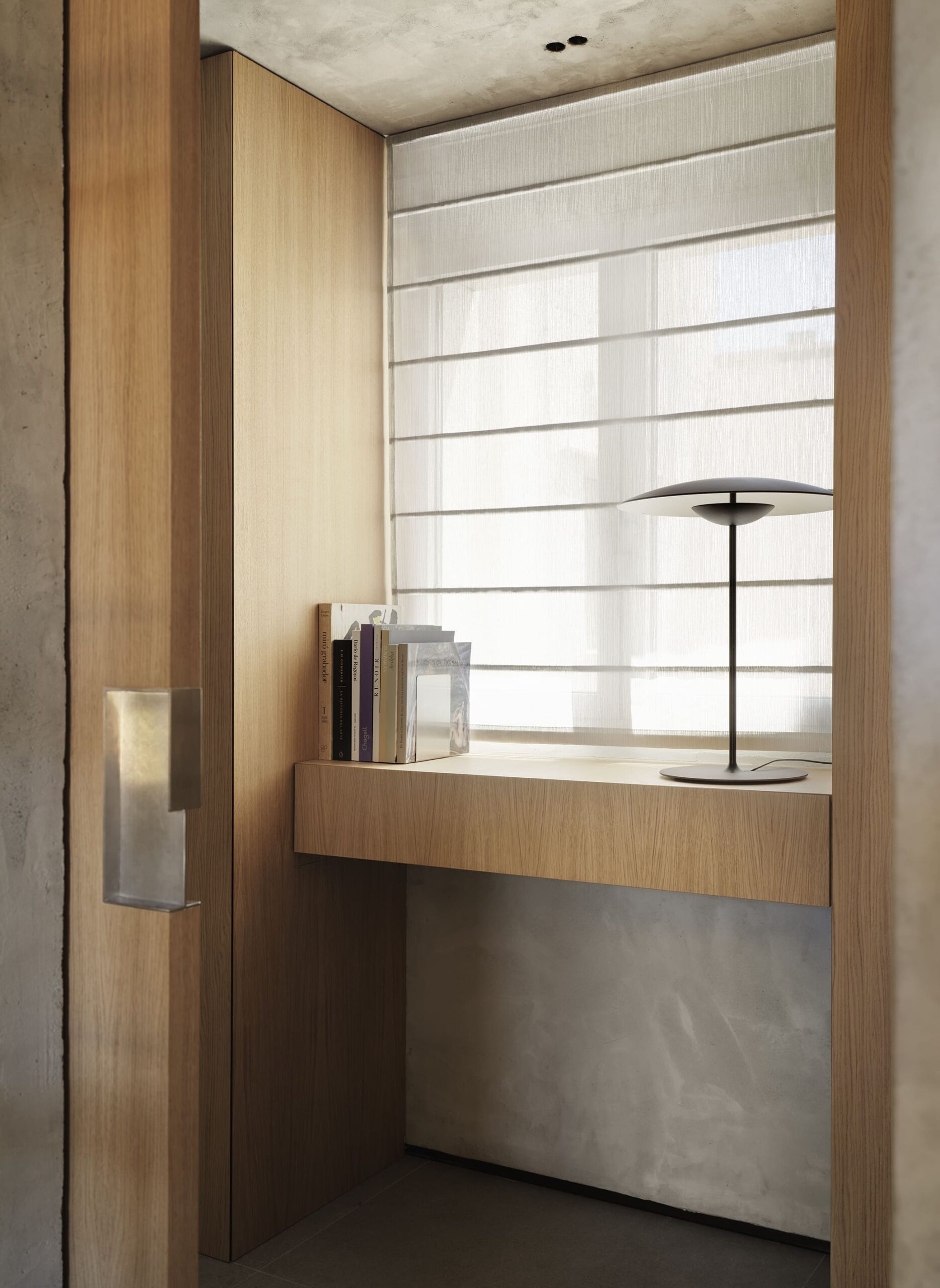 Natural wood and microcement finishes in contemporary interior design